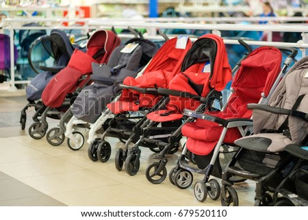 Variety of baby carriages and strollers in kids mall