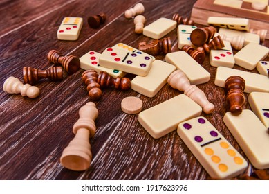 A variety of board game pieces. A background miscellaneous board game pieces. - Shutterstock ID 1917623996