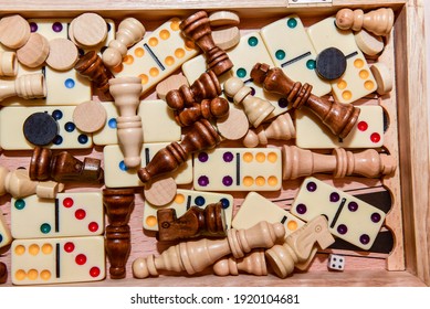 A variety of board game pieces. A background miscellaneous board game pieces. - Shutterstock ID 1920104681