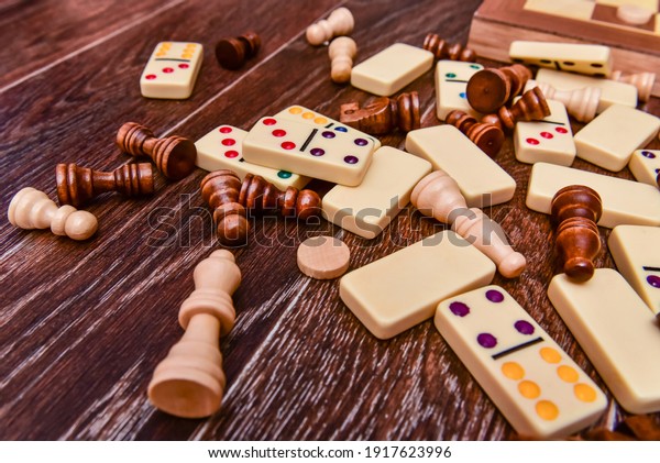 A variety of board game pieces. A background\
miscellaneous board game\
pieces.