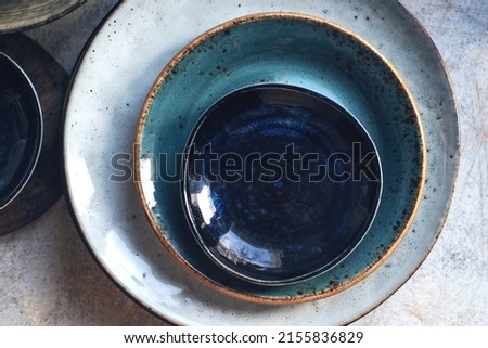 Similar – empty old soup plate with spoon on old wooden background