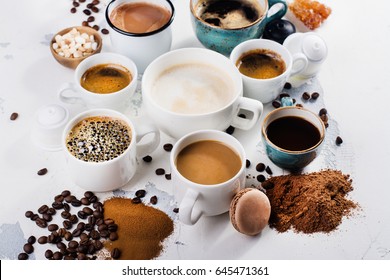 Variety of coffee in ceramic cups. Flat lay style. Time for coffee concept. Space for text