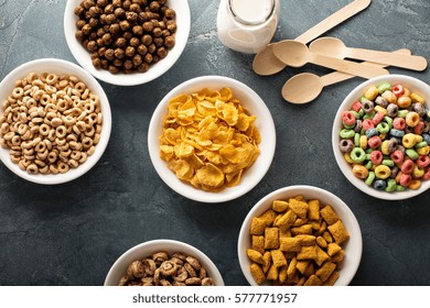 Variety Of Cold Cereals In White Bowls, Quick Breakfast For Kids Overhead Shot