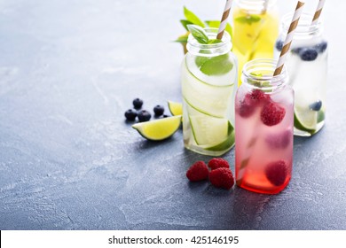 Variety of cold drinks in small bottles - Shutterstock ID 425146195