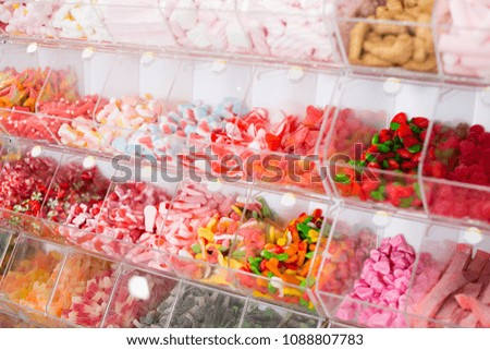 Variety of colored sweets on the store shelves