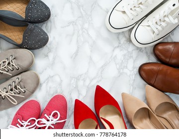 Variety Of The Colorful Woman Shoes On White, Marble, Elegant Background. High Heels And Sneaker Shoes Standing In Circle On White Background, Top View, Flatlay, Flat Lay, Woman, Femine