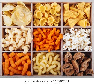 A Variety Of Crunchy Snacks In A Box