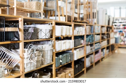 Variety Of Decorative Storage Boxes Displayed On Shelving In Household Goods Store. Concept Of Goods To Organize Home Space