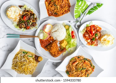 Variety Of Delicious Asia Muslim Malay Daily Home Cooked Food On Table. Flat Lay Top Down Table View.