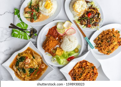 Variety Of Delicious Asia Muslim Malay Daily Home Cooked Food On Table. Flat Lay Top Down Table View.