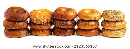 Variety of Different Bagel Flavors Isolated on a White Background