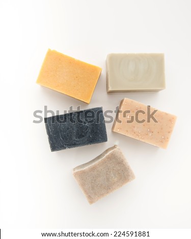 Variety of Five Artisan Organic Soaps on White Background
