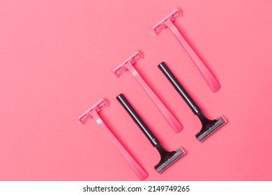 Variety of Five Colorful Pink and Black Disposable Razors Shavers Placed Together Over Trendy Pink Coral Background.Horizontal Image Composition - Shutterstock ID 2149749265