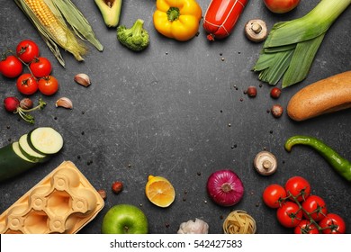 Variety of food products on grey background - Powered by Shutterstock