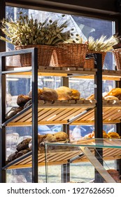 Variety Of Fresh Baked Artisan Bread On A Shelf In Bakery Shop. Gourmet Breads For Sale. Selective Focus.