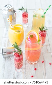Variety of fruity cocktails on a wooden background - Shutterstock ID 761064493