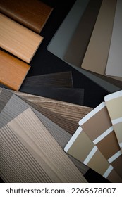 Variety of furniture  material samples for interior design. Composition with samples of furniture, building and natural materials. Top view.

 - Shutterstock ID 2265678007