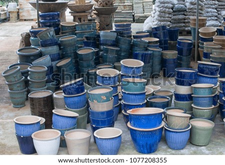 Similar – many part colorful tin buckets at the flea market