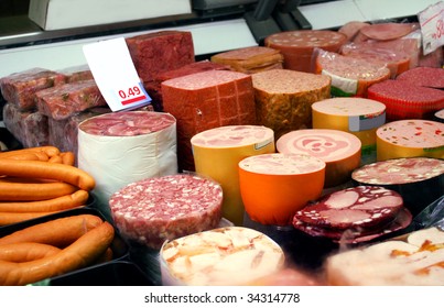 A Variety Of German Sausage Products In Cooling Shelf