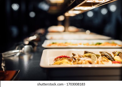 Variety Of Healthy Dishes Decorated And Served For A Special Occasion Celebration Buffet Dinner.Mediterranean Ketogenic Diet.Grilled Fish And Vegetables.Healthy Wedding Dinner Restaurant Buffet Menu