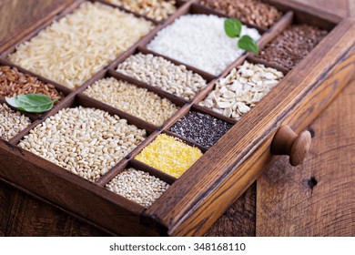 Variety Of Healthy Grains And Seeds In A Wooden Box