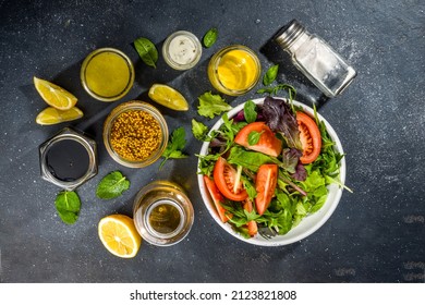 Variety of homemade salad dressings. Set of various salad sauces, oil, vinaigrette, mustard, mayonnaise, ranch, balsamic, soy, yogurt dressings