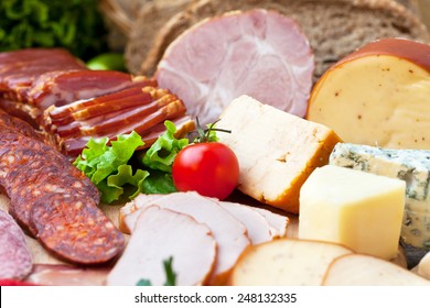 Variety Of Meat Products And Cheese