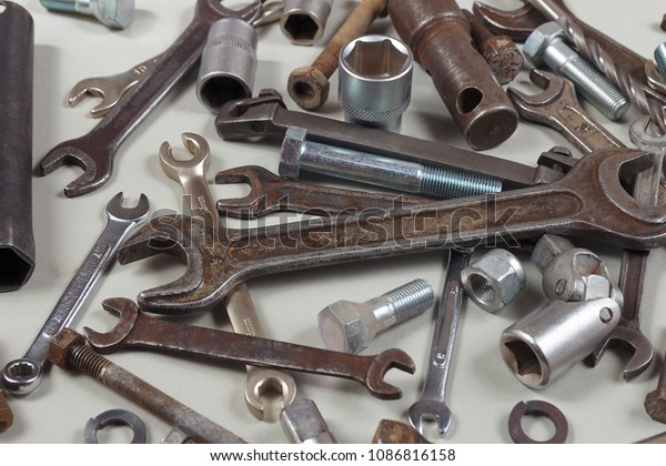 Variety of metal\
tools for car repair close\
up