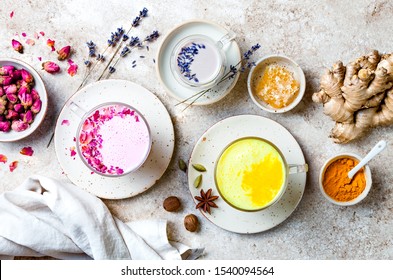 Variety of Moon Milk for a better sleep. Turmeric golden milk, pink rose milk and lavender moon milk. Trendy relaxing bedtime drink