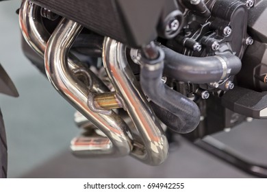 a variety of motorcycle parts, note shallow depth of field - Shutterstock ID 694942255