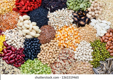 Variety of natural cereal food consisted of soybean,rice,goji berry,sesame,pumpkin,watermelon,sunflower seed,black eye pea,mung,peanut,flax seed,corn,pinto,garbanzo,black,gree,and  red bean seed - Powered by Shutterstock