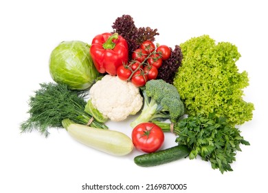 Variety Of Organic Vegetables Cabbages, Zucchini And Leafy Greens Isolated On White