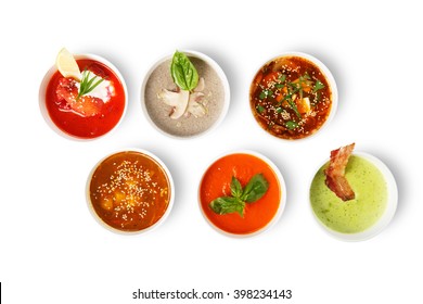 Variety Of Restaurant Hot Dishes, Healthy Food. Japanese Miso, Asian Fish Soup, Russian Borscht, English Pea Soup, Mushroom Soup, Spanish Gazpacho Isolated At White. Top View, Flat Lay.