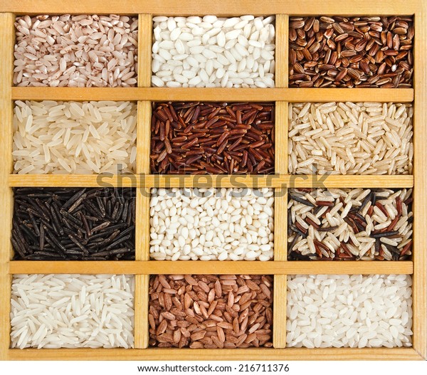 variety of rice\
grains (white, brown, black, wild, basmati, arborio, short, long\
grain) in vintage wooden case\
box