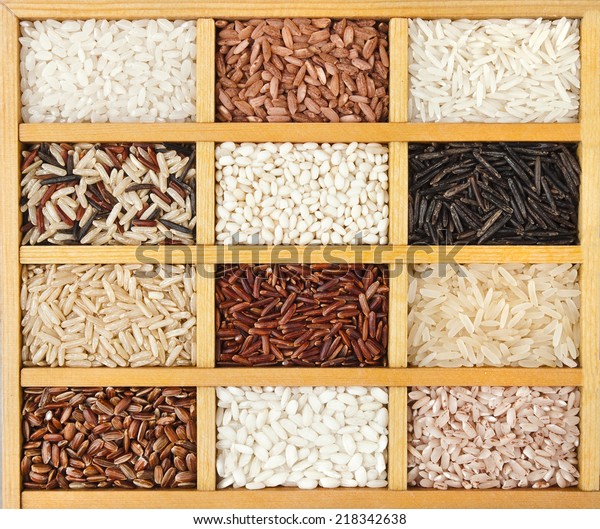 variety of rice\
grains (white, brown, black, wild, basmati, arborio, short, long\
grain) in vintage wooden case\
box