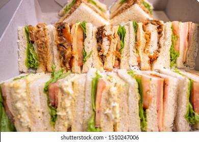 Variety Of Slices Of Sandwhich Pack In A White Box