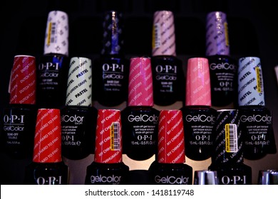 Variety of stylish, fashionable, diverse, colorful nail polishes on showcase in cosmetic boutique in Brussels, Belgium on Nov. 23, 2016