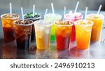 A variety of takeaway drink options, including iced coffee, tea, and juices, in transparent cups with straws. The drinks are colorful and refreshing, appealing to a wide range of tastes.