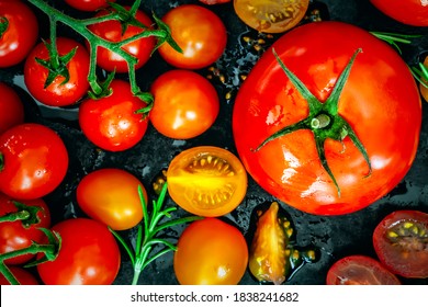 Variety Of Tomatoes, Top View, Over Black.  Beef Tomato, Cherry Tomatoes, Roma And Truss, Whole And Cut.