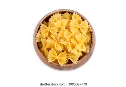 A variety of types and shapes of Italian pasta. Dry pasta bows farfalle. Heap of bow tie macaroni isolated on white background. Butterfly pasta. - Powered by Shutterstock