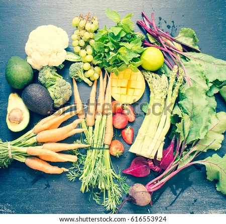 Variety of vegetables and fruits. Vegan food or diet eating concept.Toned photo