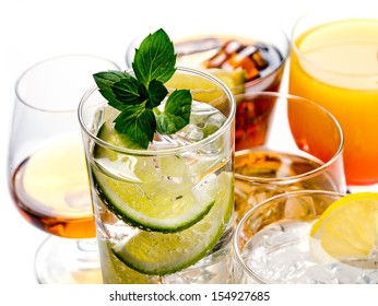 Various Alcoholic Cocktails On White Background