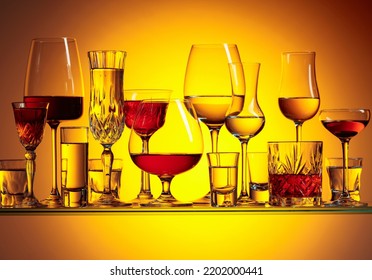 Various Alcoholic Drinks In The Bar On A Yellow Background.