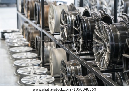 Various alloy wheels in store, selective focus.
Car alloy wheels at a wheel shop.