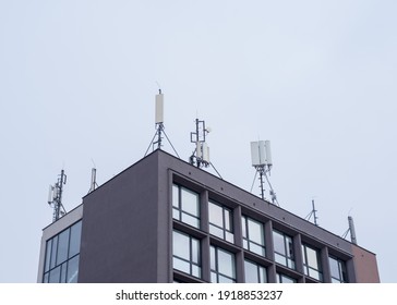 Various Antennas On The Roof Of A Building In The City, The Harm Of 5G Technologies Concept