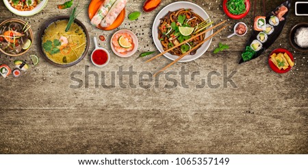 Various of asian meals on rustic background , top view , place for text. Asian food concept.