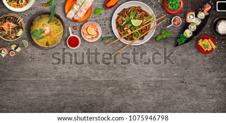 Various of asian meals on rustic background , top view , place for text. Asian food concept.