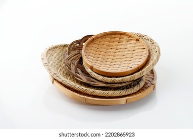 Various Bamboo And Rattan Plate, Isolated On White. Asian Traditional Dish For Food Serving, Go Green Concept