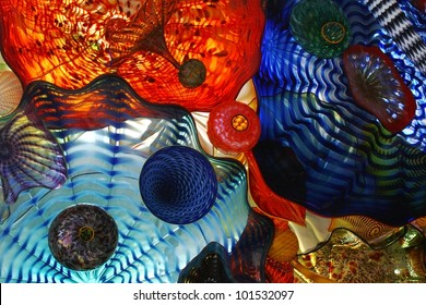 Various Blown Glass Objects Piled Together To Create Some Beautiful Color And Texture./ Blown Glass, A World Of Color / Very Beautiful Example Of Blown Glass Colors. A Great Artistic Background, Or?