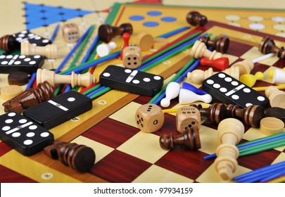 Various Board Games And Many Figurines Background